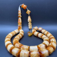 Pressed Amber Tasbih with Insect Inclusion, 33 Beads, 68g
