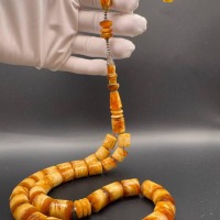 Pressed Amber Tasbih with Insect Inclusion, 33 Beads, 68g