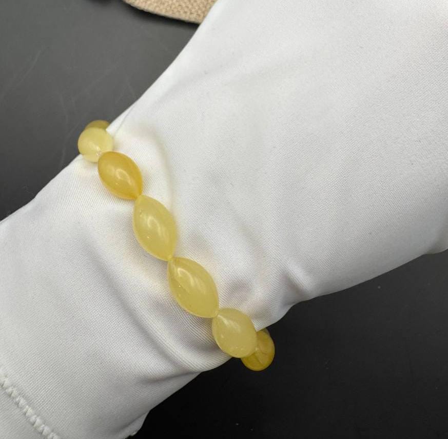 il_fullxfull.6729261301_lcfd.jpg Milky Honey Baltic Amber Bracelet, Oval Beads, 7.4g