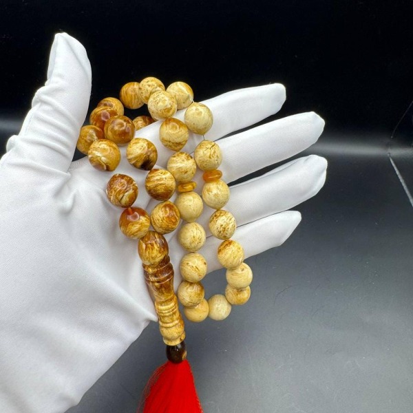Pressed Baltic Amber Tasbih with Red Tassel, 33 Beads, 41.5g