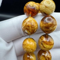 il_fullxfull.6769322254_tkd8.jpg Pressed Baltic Amber Tasbih with Red Tassel, 33 Beads, 41.5g