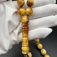 il_fullxfull.6817333699_tqgt.jpg Pressed Baltic Amber Tasbih with Red Tassel, 33 Beads, 41.5g