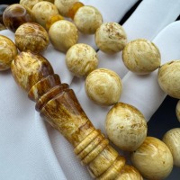 il_fullxfull.6817333701_h2ou.jpg Pressed Baltic Amber Tasbih with Red Tassel, 33 Beads, 41.5g