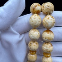 il_fullxfull.6817333705_6rcl.jpg Pressed Baltic Amber Tasbih with Red Tassel, 33 Beads, 41.5g