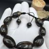 Baltic Amber Bracelet: Black Brown Beads with Earth Inclusions