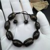 Baltic Amber Bracelet: Black Brown Beads with Earth Inclusions