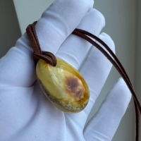 il_fullxfull.8184760401_8q2d.jpg Butterscotch Baltic Amber Pendant, Polished Oval, 6g